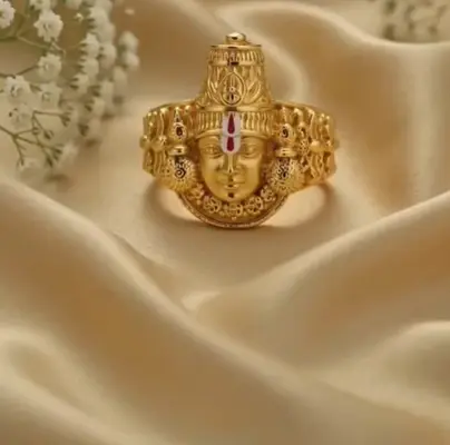 Gold Balaji ring resting on gold silk