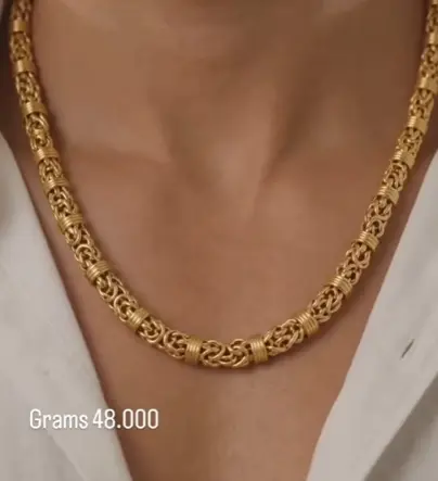Byzantine link gold chain worn, captioned Grams 48.000