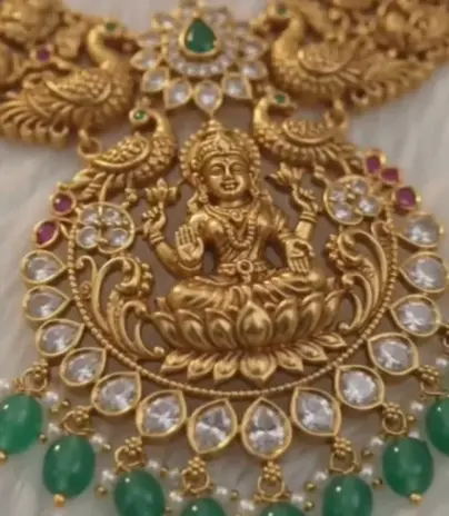 Lakshmi pendant in kundan with peacocks, green bead drops